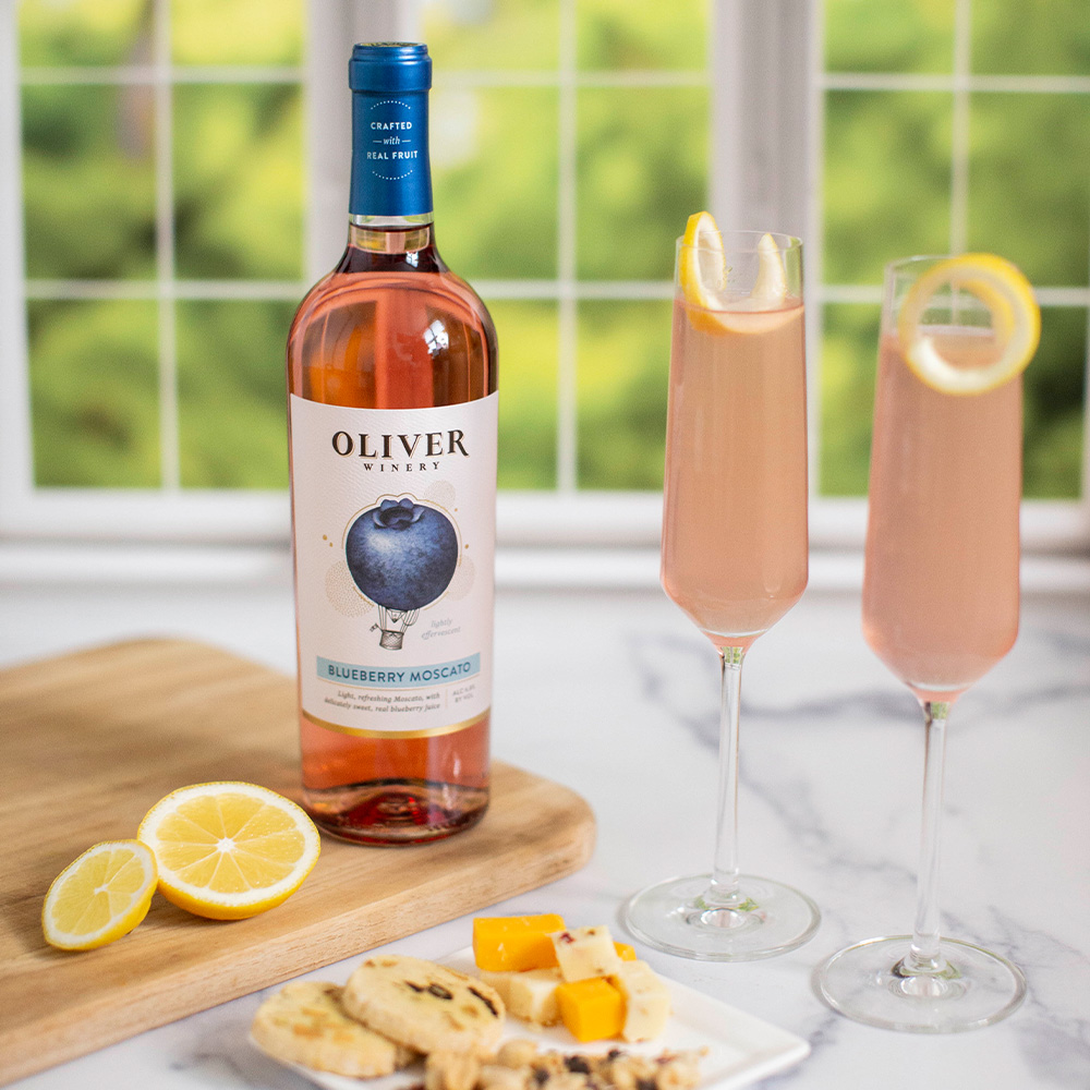 Oliver Winery's Blueberry Moscato, in a refreshing, light take on the classic French 75 cocktail. Garnished with a lemon twist..